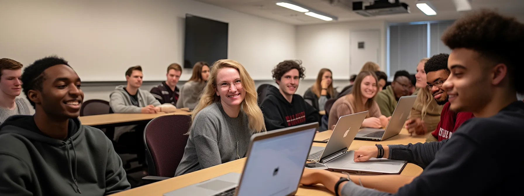 a group of students sitting in a classroom, attentively listening to an instructor discussing seo metrics and website optimization.